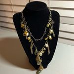 Charm necklace with earth, tone beads Brown Photo 0