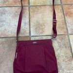 Tumi crossbody travel bag/purse Photo 0