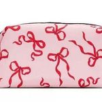 Pink and Red Cosmetic Bag with Bow Pattern Photo 0