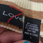 7 Love metallic brown & cream turtleneck sweater- Size Large***refer to measurements for size. Gently Warn and excellent condition. Measurements approximately from armpit to armpit 15” not fully stretched out x 23” long. None smoking home. Priced at as is condition. Don’t like my price make a reasonable offer! And thank you for checking my closet! Photo 4