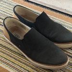 UGG  Black and Tan Slip-On Loafers Photo 0