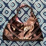 BCBGirls BCBGIRL Brown and Pink Metallic Purse with Flowers Photo 0