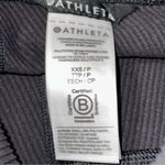 Athleta  NWT Women’s XXS Black Salutation Stash Pocket II Rib 7/8 Tight Leggings Photo 5