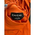 Bebe Logo Y2K Short Sleeve Logo Dress with Lace Up Back, XS, Dragon Fire Orange Photo 7