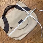 Classic Fashion Outback bag. Tan with pebbled leather handles and trim. Photo 8