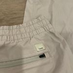 Vuori  Vintage Ripstop Mid Rise Raw Hem Ankle Pant in Light Pink Photo 5