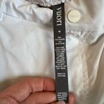 Vuori  Women’s Pleated Shorts White – Size Medium Photo 1