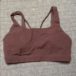 Athleta Lot of 4  sport bras. All size M Photo 2