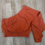 Pink Lily  One-Shoulder Top Photo 0