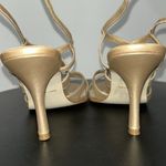 White House | Black Market  metallic gold heels Photo 3