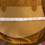 See By Chloe Chloe EUC Tan Crossbody Saddle Bag with Decorative Closure and Tassel Photo 5