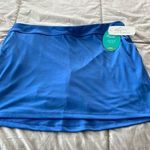 Greg Norman golf skort size Med Blue Photo 0