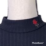 Justify  large casual high neck black ribbed long sleeve blouse with rose on neck Photo 1