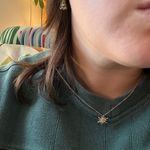 ViVI Gold Starburst Necklace with Crystal Accents Photo 3