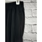 Aritzia TNA The Riley pant in black, size S. Black Photo 3