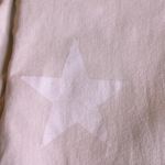 Altar'd State Altar’d State star patterned flare pants Photo 3