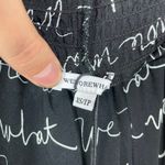 We Wore What NWT‎  Woman's Sz XS Black Sheer Flared Leg Logo Print Smocked Pants Photo 7