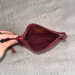 Coach x Disney Minnie Mouse Small Wristlet With Motif Photo 3