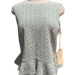 Sunday in Brooklyn  Peplum top with a geometric pattern  
Fits like a Small NWT Photo 1