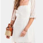 Francesca’s Daisy floral cream mini dress White Size M Photo 1