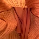 All in Favor size medium mid length dress. Zips up the back. Faux buttons. Lined Photo 6