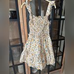 Tuckernuck Ella Blu eyelet floral smocked mini dress tiered ruffle sleeveless marigold Photo 7