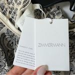 Zimmermann  Wylie Lantern Cotton Mini Dress in Black Photo 7