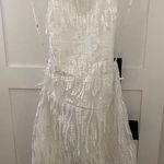 Lulus Lulu’s Making Magic White Fringe Lace-Up Mini Homecoming Dress Photo 0