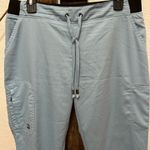 Grey's Anatomy Grey’s Anatomy Mia mid-rise scrub pants in blue Photo 6