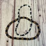 Beaded Bracelets in Black, Gold, and Silver Photo 4