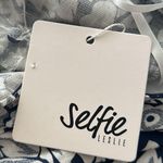 Selfie Leslie  | Navy Floral Open Back Dress Photo 3