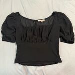 Peach Puff Black blouse with ruffled sleeves  Photo 0
