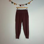 Athleta  Venice Velvet Stripe Jogger in Antique Burgundy Photo 1