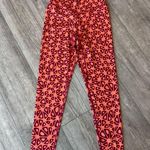 VITALITY x COSMOPOLITAN Vibrant Red and Orange Patterned Leggings Size M Photo 1