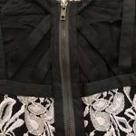 Free People floral embroidered, flowy tank top with strappy zip up back Photo 12