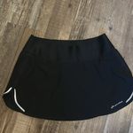 Brooks Black Infinity Running Shorts/Skirt Sz Small w/ Reflective Bands Photo 1