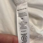 Athleta  Women’s Athletic Shirt size XL color white length 28” bust 40” Photo 7