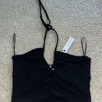 Olivaceous  Black going out top Photo 0