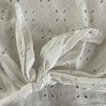 Olivia Rae Livi By  White Tank Top With Flower Pattern And A Knot Photo 3