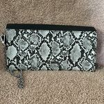 Steve Madden clutch crossbody purse black/snake print with silver chain Photo 1