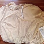 Lululemon  lightweight high neck open back romper in prosecco nwt size 8 Photo 2