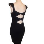 Free People  BLACK CUT OUT SLEEVELESS STRETCH BODYCON RUFFLE SLEEVE CUTOUT DRESS Photo 1