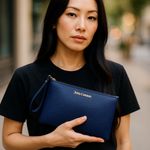 Juicy Couture  Large Navy Blue Wristlet Clutch Purse ~ NWOT ~ Gold Emblem Photo 0