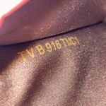 Valentino Garavani Valentino women’s Toile de V leather and canvas jacquard clutch wristlet bag Photo 8