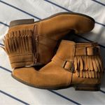 Minnetonka brown moccasin boots with fringe Photo 1