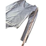 Everlane Supima Cotton Long-Sleeve V-Neck Bodysuit T-Shirt In Dusty Lavender Photo 10