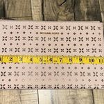 Michael Kors  Floral Cutout Eyelet Light Pink Leather Zip Wristlet Clutch Purse Photo 1