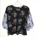 Ann Taylor Loft black floral top contrasting print on balloon sleeve
Size Small Photo 7