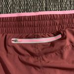Fabletics Breathe Mid-Rise Lined Run Shorts Maroon Photo 2