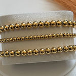 Elegant Titanium Gold Beaded Bracelet Set Photo 0